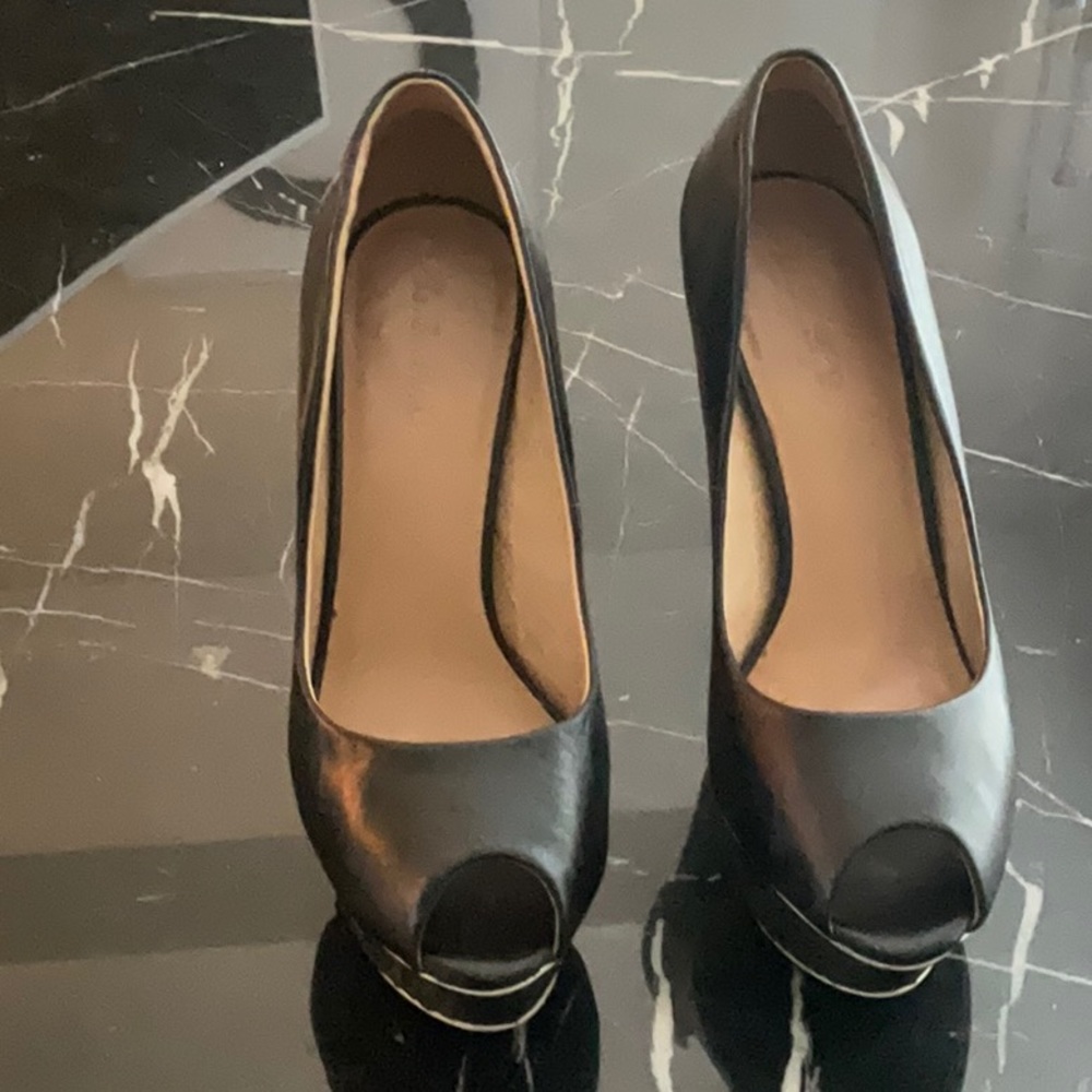 L.A.M.B platform peep toe pumps.